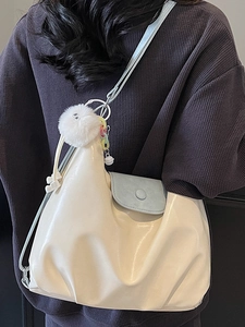 Chic beige and light blue contrast shoulder tote bag with cute plush ball and chain detail