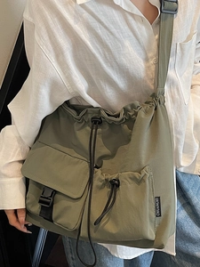 Army green large nylon tote bag with drawstring closure and adjustable strap