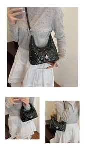 Detailed views of black quilted underarm bag with silver star and punk studs decoration