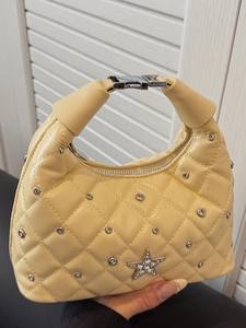 Chic quilted beige shoulder bag with silver star studs and rhinestone details