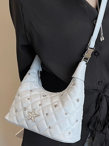 Light blue quilted leather shoulder bag with sparkling rhinestone star buckle and silver studs