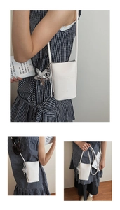 Detail view of a white leather bucket bag with starfish charm shown from multiple angles