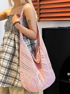Pink handmade crochet tote bag for women featuring vintage hollow knit patterns and large capacity