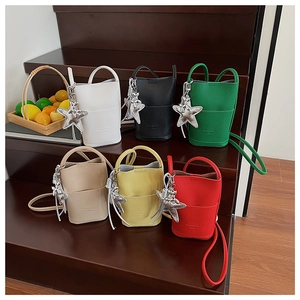Litchi texture leather bucket bags in six colors featuring silver star pendants