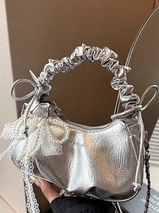 Silver pleated cloud handbag with pearl bow and lace ribbons for a balletcore style