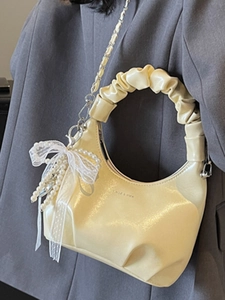 Chic beige crescent handbag with pleated handle and pearl lace bow for women