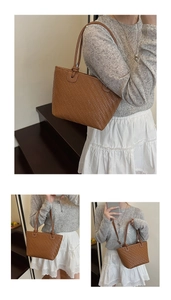 Detailed view of brown woven tote bag showing premium PU texture and shoulder strap