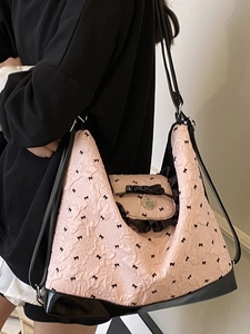 Pink and black bow jacquard tote bag with stylish shoulder straps and heart charm