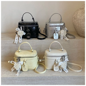 Group display of chic vanity bags with leather texture and heart pearl charms