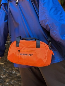 Orange nylon sports crossbody bag with letter print for outdoor hiking and leisure