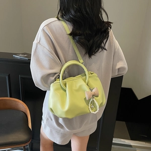 Chic pleated cloud shoulder bag in light green faux leather with pearl bow charm