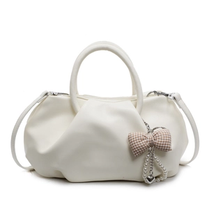 Chic cream pleated cloud tote bag with decorative pearl charm and bow strap details