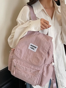 Fashionable lavender nylon drawstring backpack with flap and front pocket for women