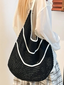 Black hollow crochet tote bag with white stripes for summer beach vacation style