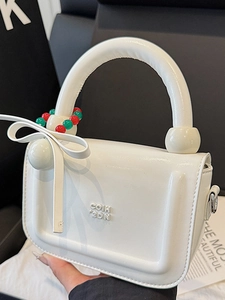 Borsa a mano bianca in pelle lucida con manico tondo e decoro di perline