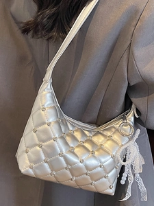 Silver quilted hobo shoulder bag with rhinestone accents and pearl bow charm