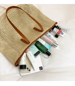 Top view of spacious straw tote bag showing large capacity for daily essentials
