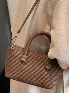Chic brown woven square handbag for women with dual top handles and leather shoulder strap