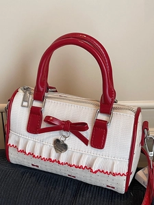 Pink bow boston bag for women with red ribbon prints and heart pendant decoration
