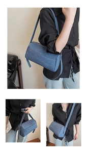 Blue denim barrel bag shown in multiple views with adjustable shoulder strap