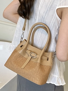 Chic woven straw bucket bag with khaki leather trim and dual round handles for women
