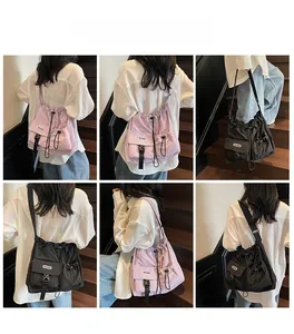 Detailed views of light purple and black pleated canvas tote bags with adjustable straps