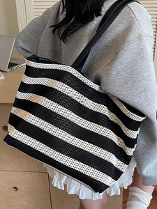 Large capacity black and white striped woven tote bag with leather straps for daily commute