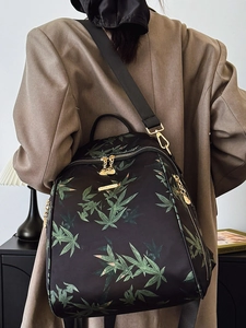 Sac à dos en nylon imperméable avec motif feuilles d'érable vertes et zip doré