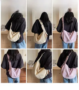 Model wearing casual large canvas crossbody bags in beige and light purple colors