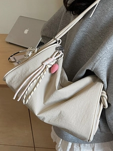 Minimalist candy-colored canvas pillow bag with heart pendant and large capacity