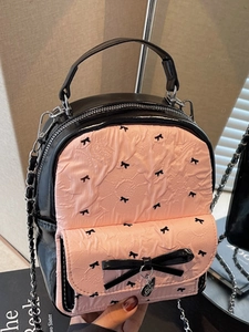 Sweet pink and black seersucker bow backpack with silver heart charm and chain strap