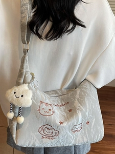 Silver wrinkled shoulder bag with cat embroidery and a cute cloud plush charm