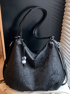 Black large capacity tote bag with embossed rose pattern and adjustable silver buckles