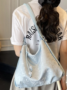 Light blue neo-Chinese tote bag with jacquard flower texture and drawstring detail