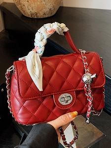 Red quilted mini handbag with floral scarf handle and silver chain strap for women