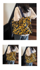Detalle del bolso tote oxford grande con estampado de girasol y bolsillo lateral de malla