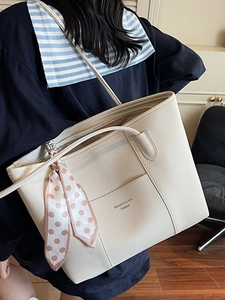 Elegant beige tote bag for women with large capacity and decorative pink polka dot scarf