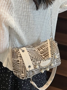 Fashionable striped Boston tote bag with pearl charms and metal chain straps
