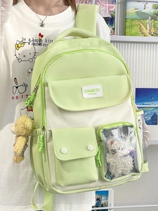 Cute green and white high-capacity school backpack with bear charm and clear pockets