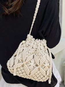 Chic cream handmade macrame woven bucket bag with wood bead drawstring for summer beach