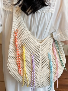 Retro hand-woven crochet mesh tote bag with colorful tassels for beach and casual vacation