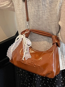 Caramel brown oil-wax leather handbag with pearl lace bow charm and fashion embossing