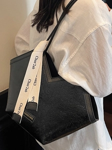 Vintage large capacity black tote bag with glossy wrinkled faux leather texture and strap