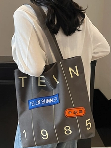 Large dark grey canvas tote bag with retro 1985 lettering for women's daily commute