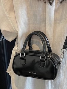 Classic black shiny Boston mini handbag for women with dual handles and silver zipper