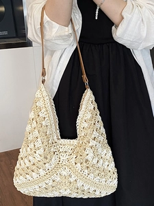 Handmade crochet woven tote bag with brown leather straps for beach and travel