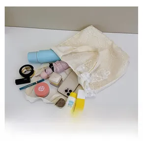 Detailed macro view showing large storage capacity of lace tote bag for daily essentials