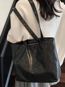 Large black minimalist tote bag with chic printed monogram patterns for women