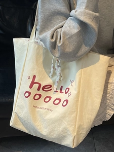 Grand sac cabas en toile crème avec imprimé graphique rose et détails floraux stylés