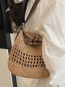 Handwoven straw shoulder bag for summer with vintage toggle closure and leather straps
